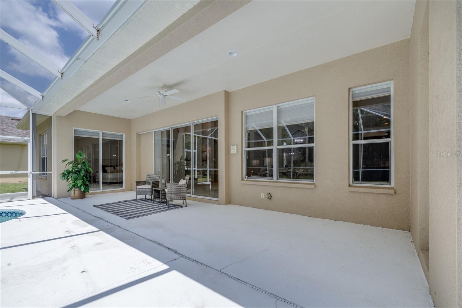 Covered lanai perfect for outdoor dining, entertaining, and relaxing year-round