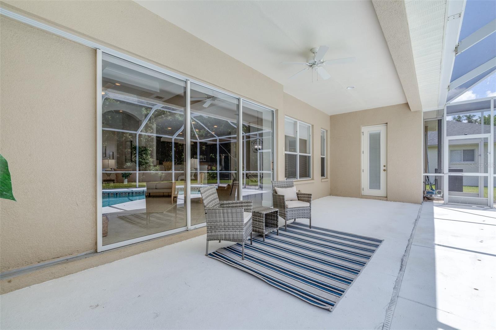 Spacious covered patio with seamless access to the indoor living areas