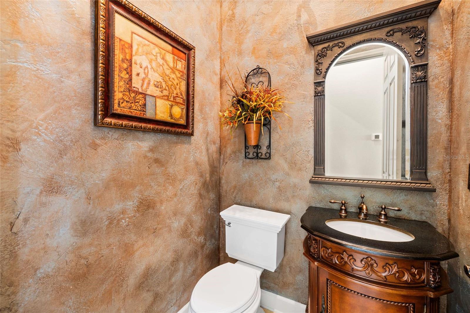 Powder Room off of Formal Living Room and Office