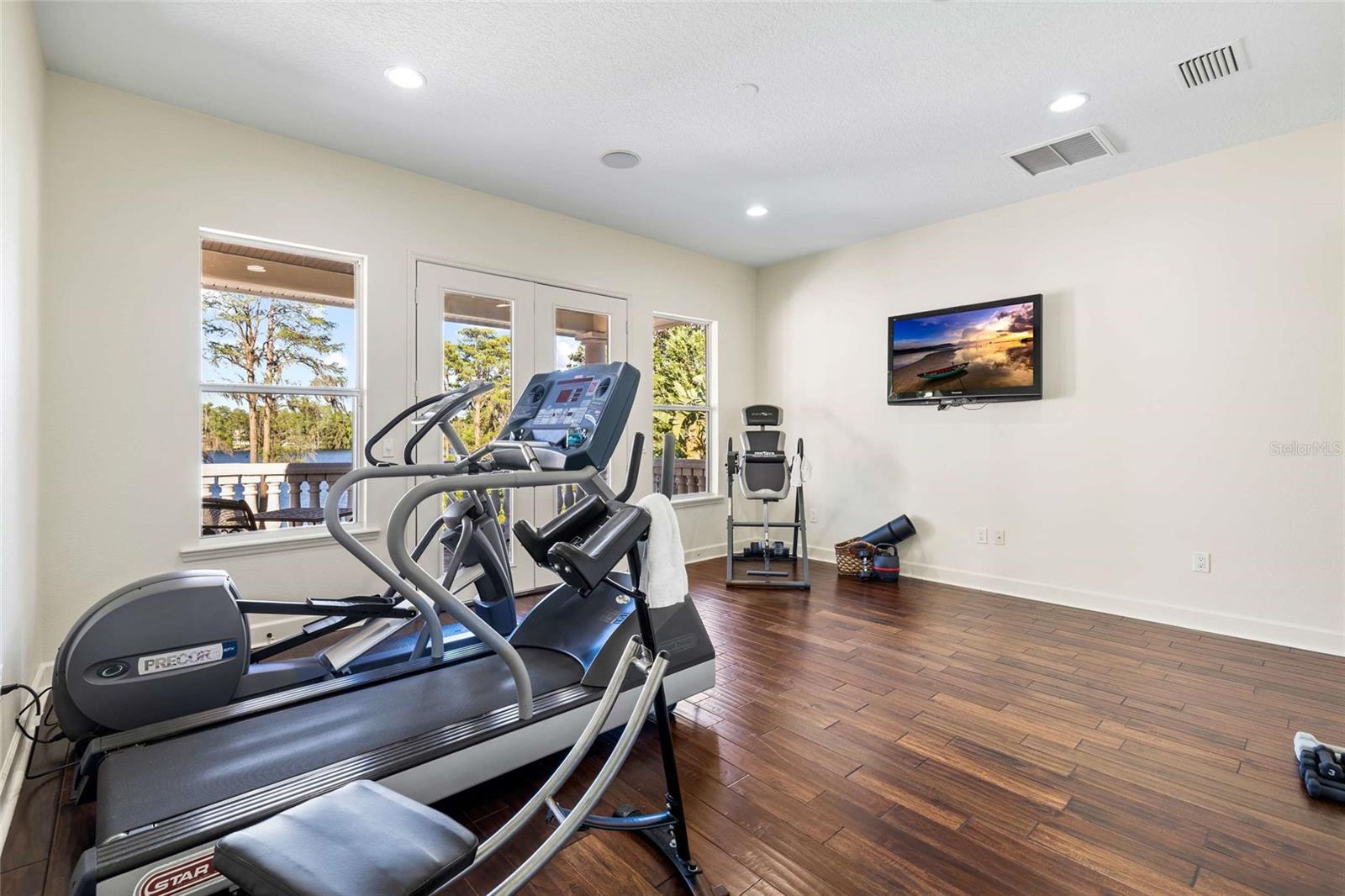 Upstairs Bedroom 4 with French Doors to Balcony Overlooking the Pool