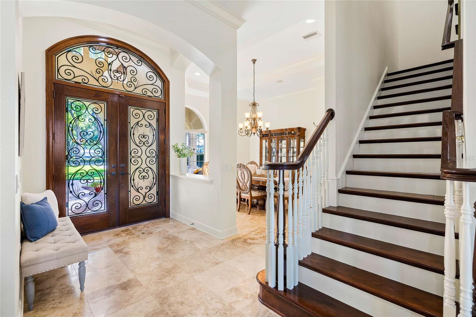 Double Door Entryway with Rod Iron Detail