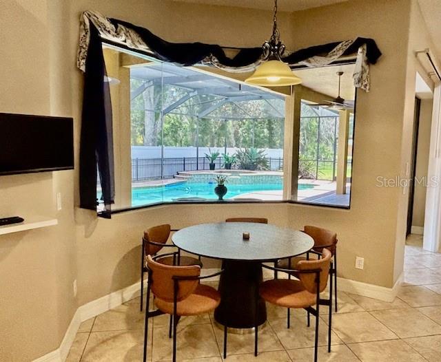 Kitchen Dinette Area w/TV  Furniture Overlooking Pool/Spa