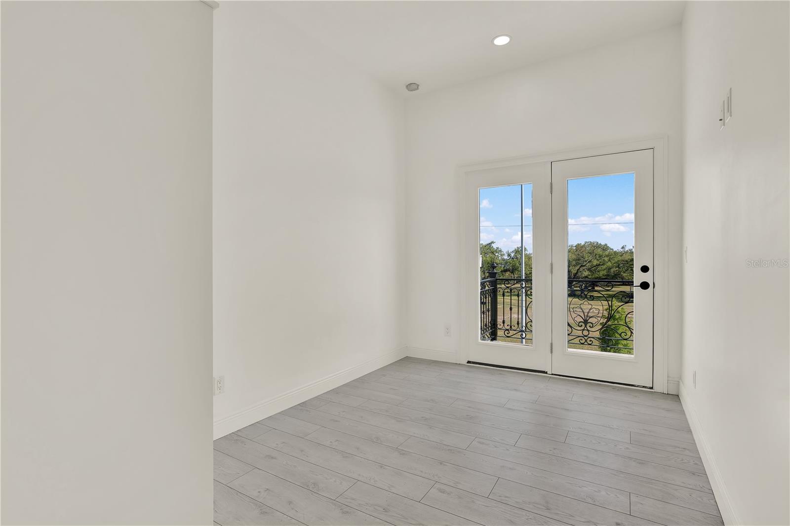 Another guest bedroom overlooking park/bay.