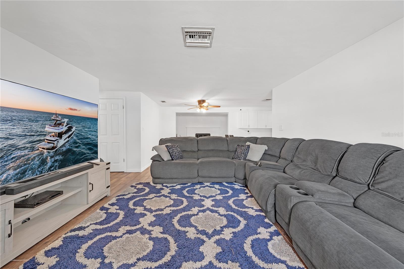 entrance to large living area with plenty of seating for family