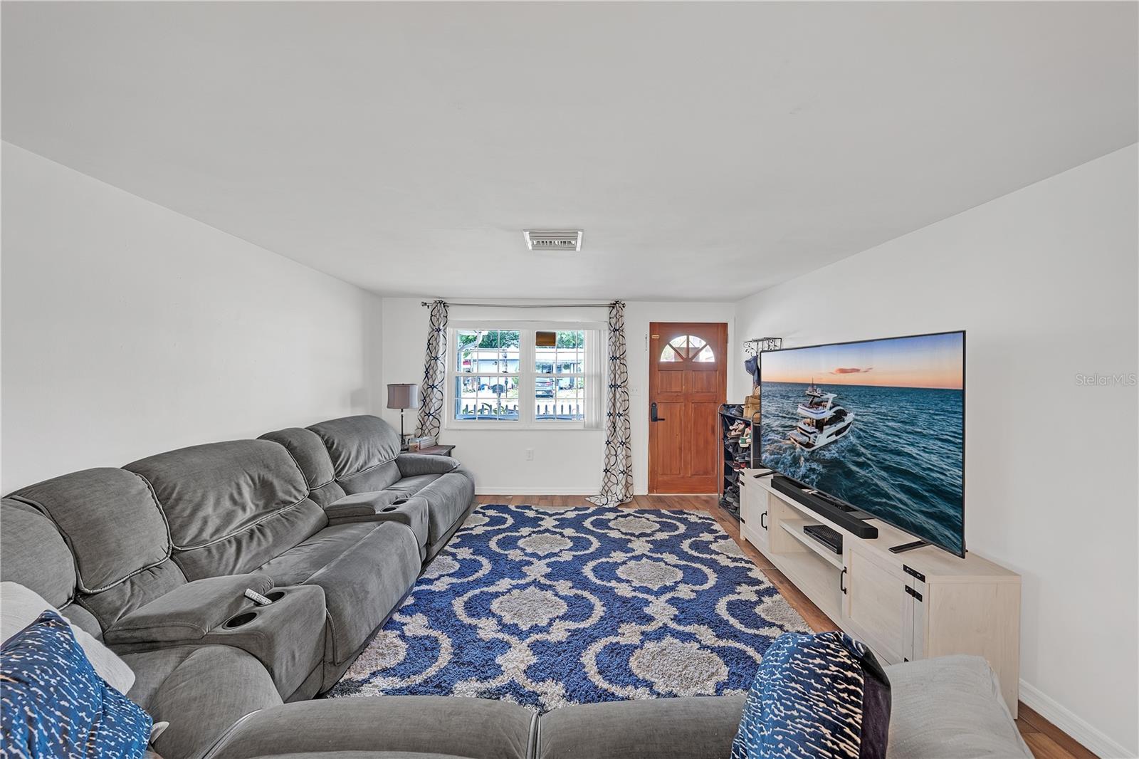 large living area with plenty of seating for family