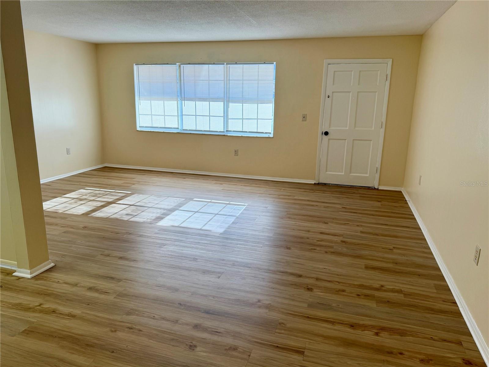 Standing in dining area looking into the living space