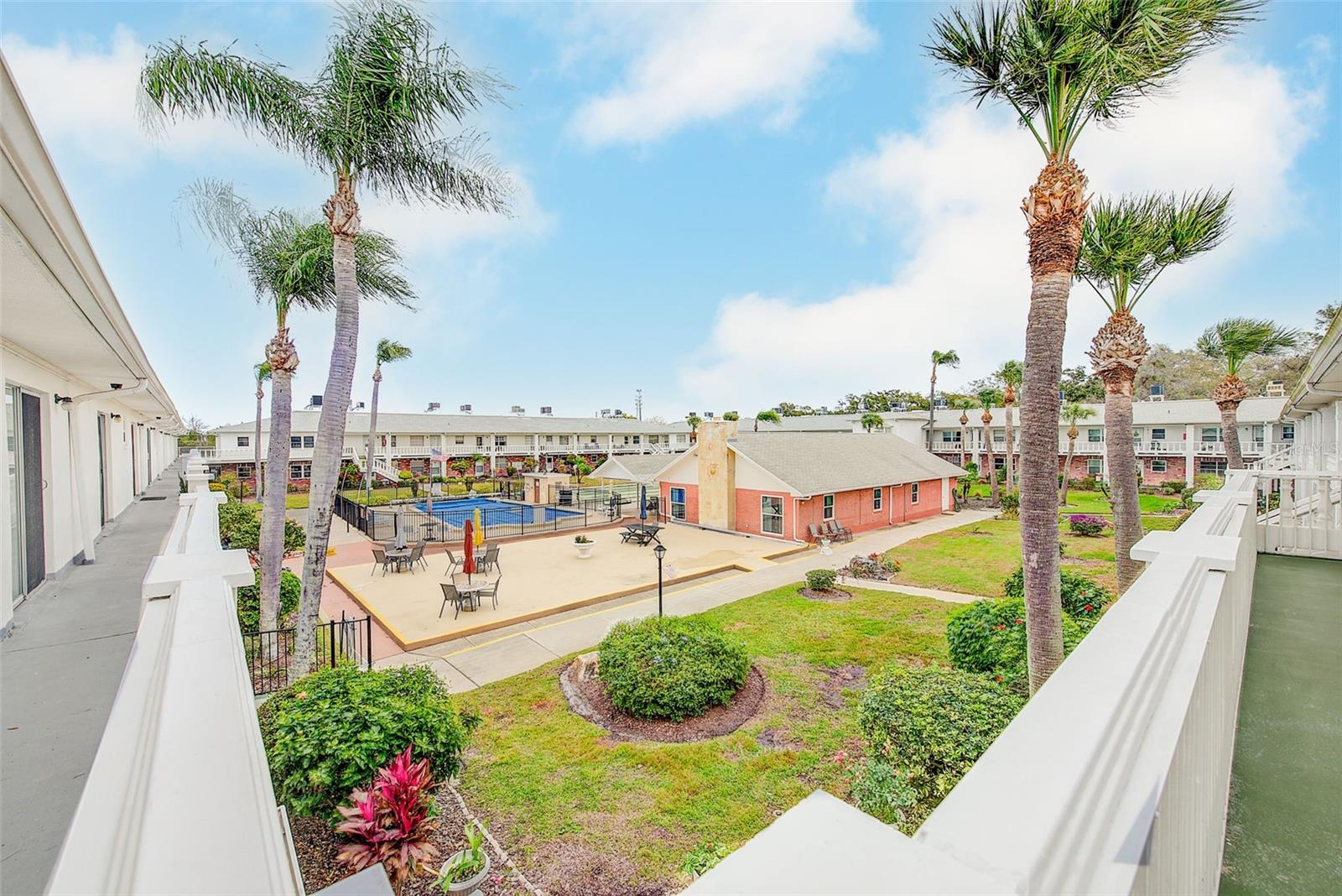 View of community pool and clubhouse