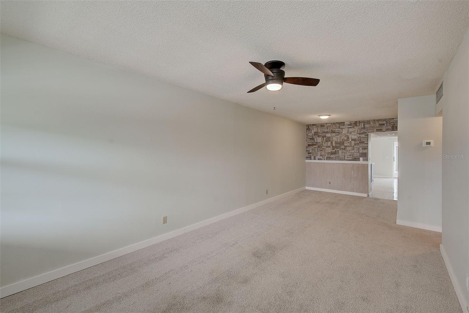 View of living room to kitchen