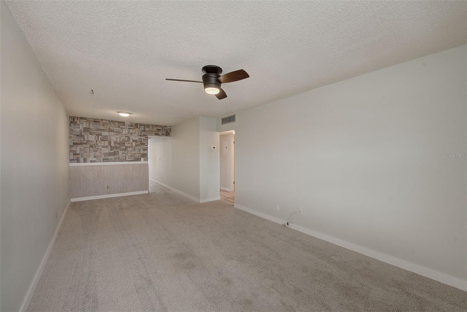 View of living room to kitchen