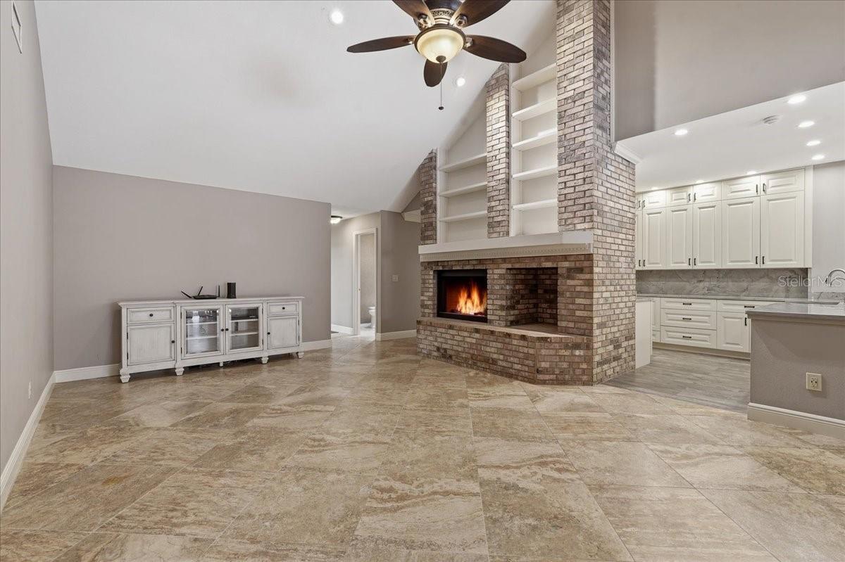 VAULTED CEILINGS IN THE FAMILY ROOM OPENING UP BEAUTIFULLY TO THE KITCHEN!