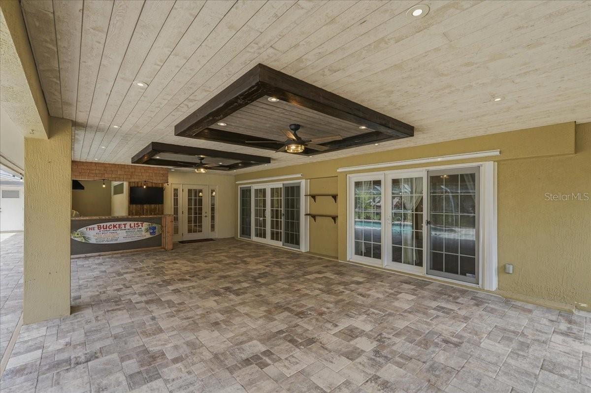 WOOD PLANK CEILINGS IN THE COVERED PATIO!