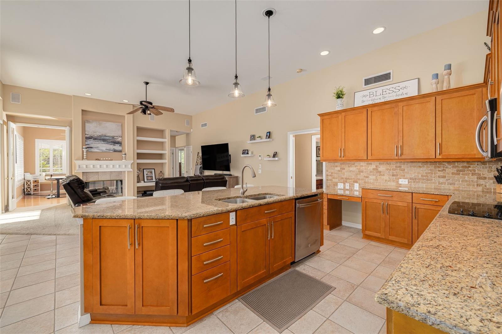 Family room adjacent to kitchen, with bonus room and dual fireplace!