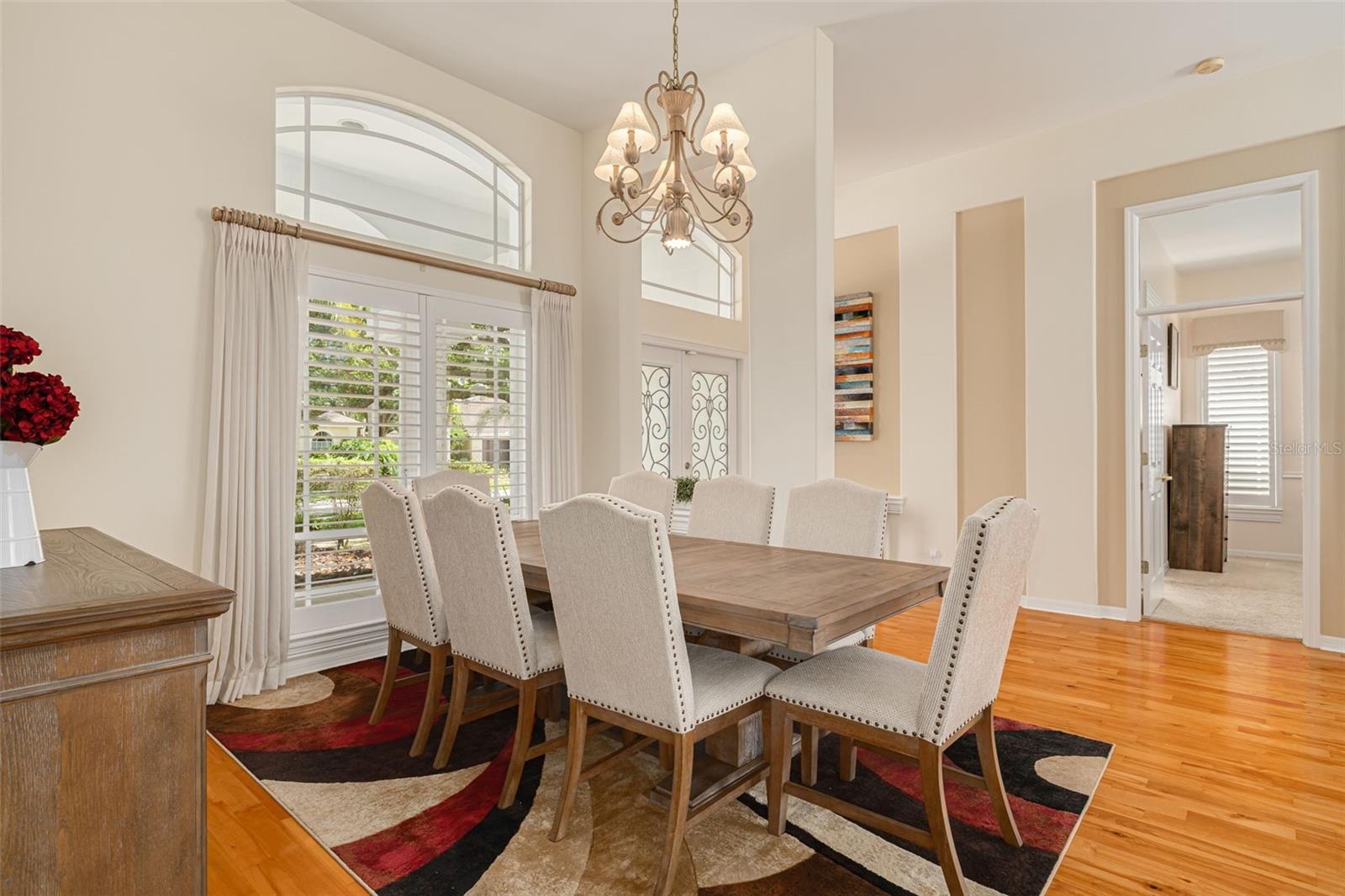 DR with primary bedroom through the door on the right