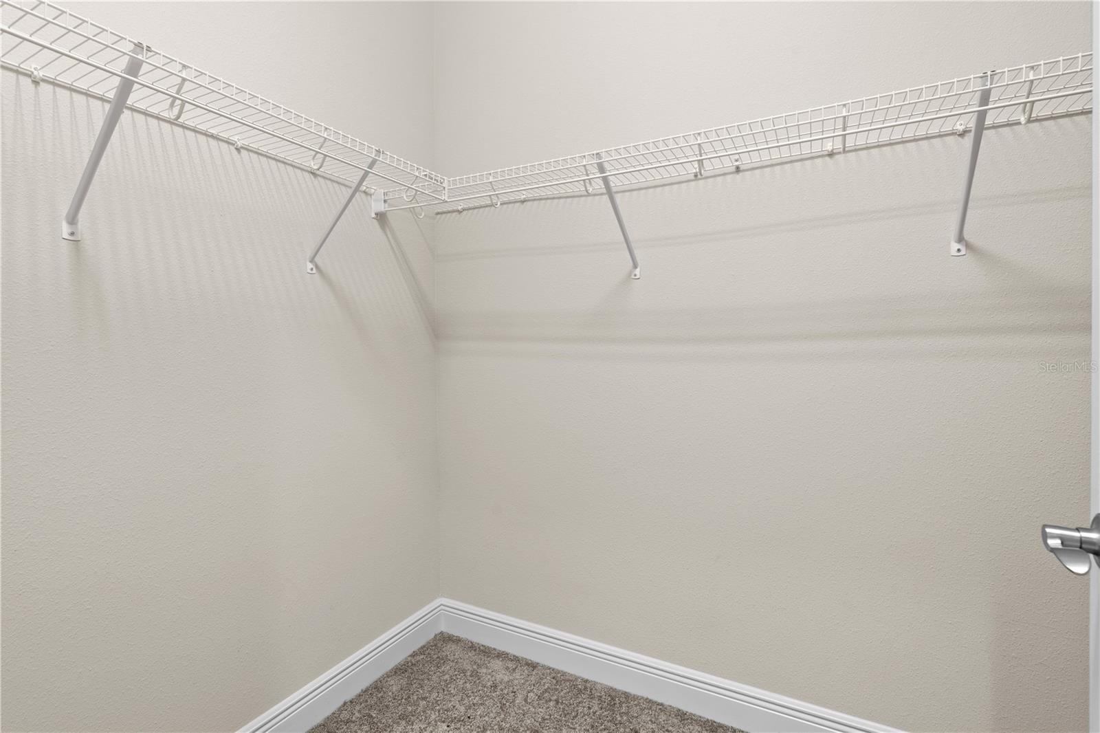 downstairs huge master walk-in closet