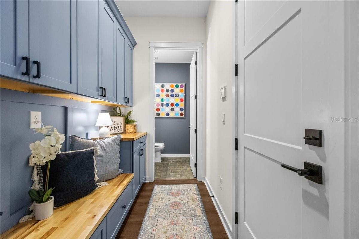 Mud Room with view to 1/2 Bath off of Entryway