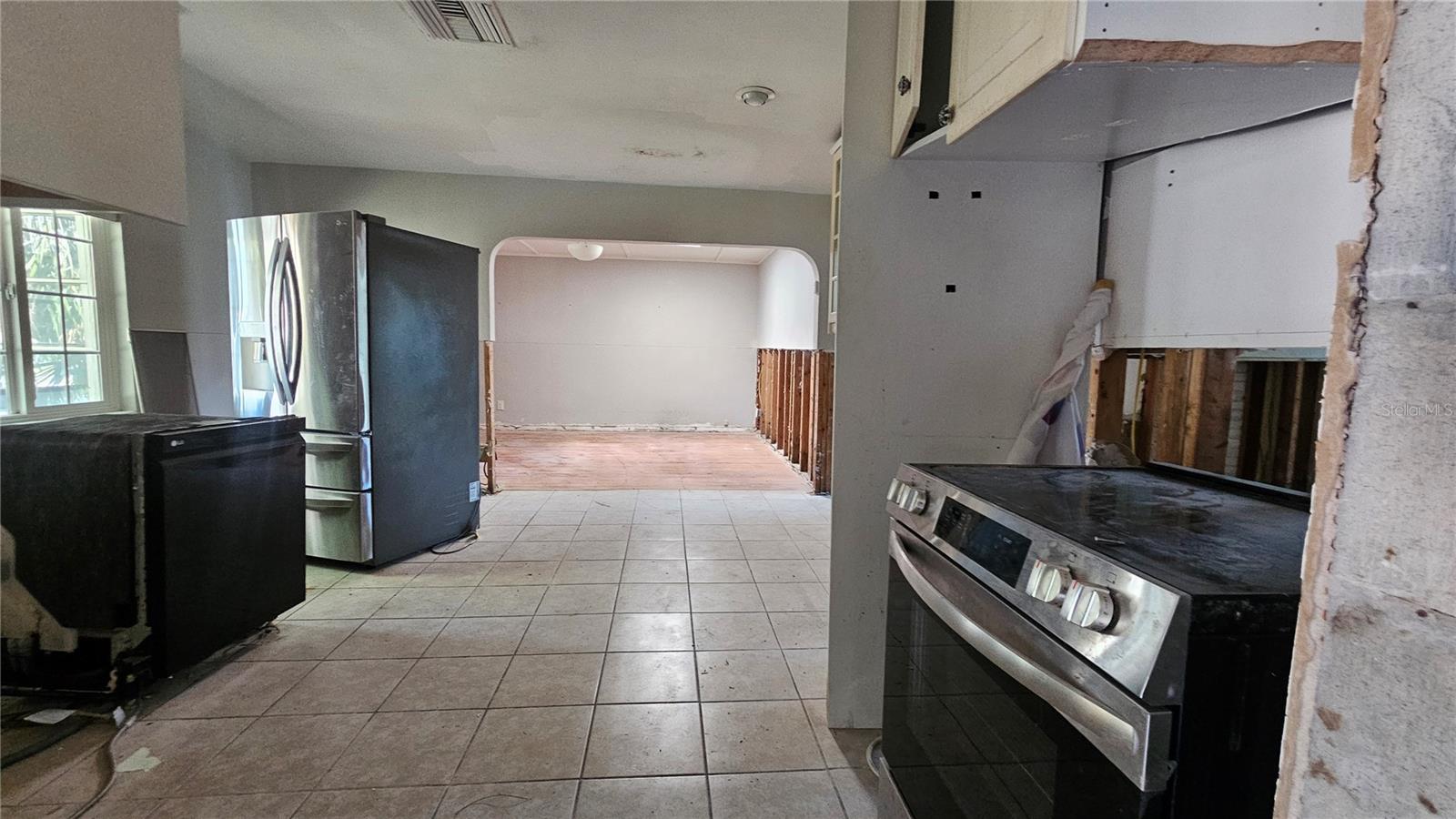 walking up the stairs to the kitchen