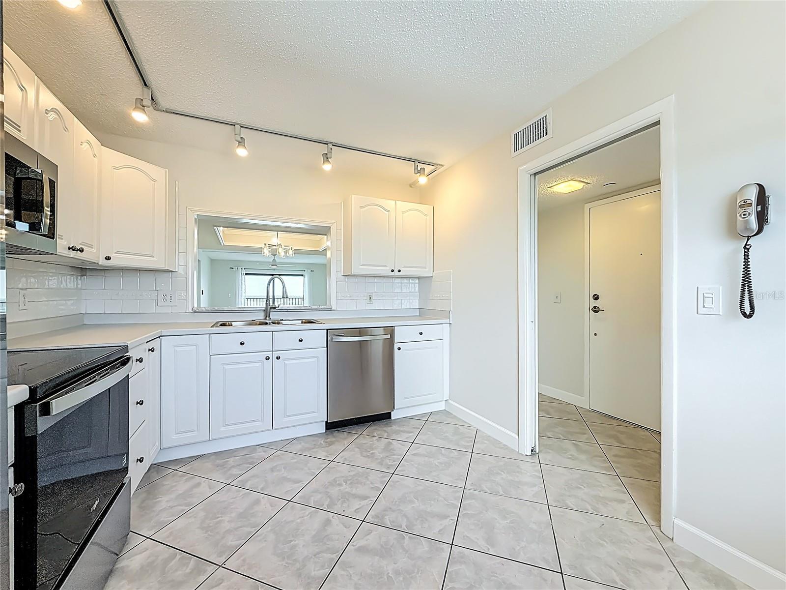 Notice your cut out by the kitchen sink that offers you a nice view out to the water
