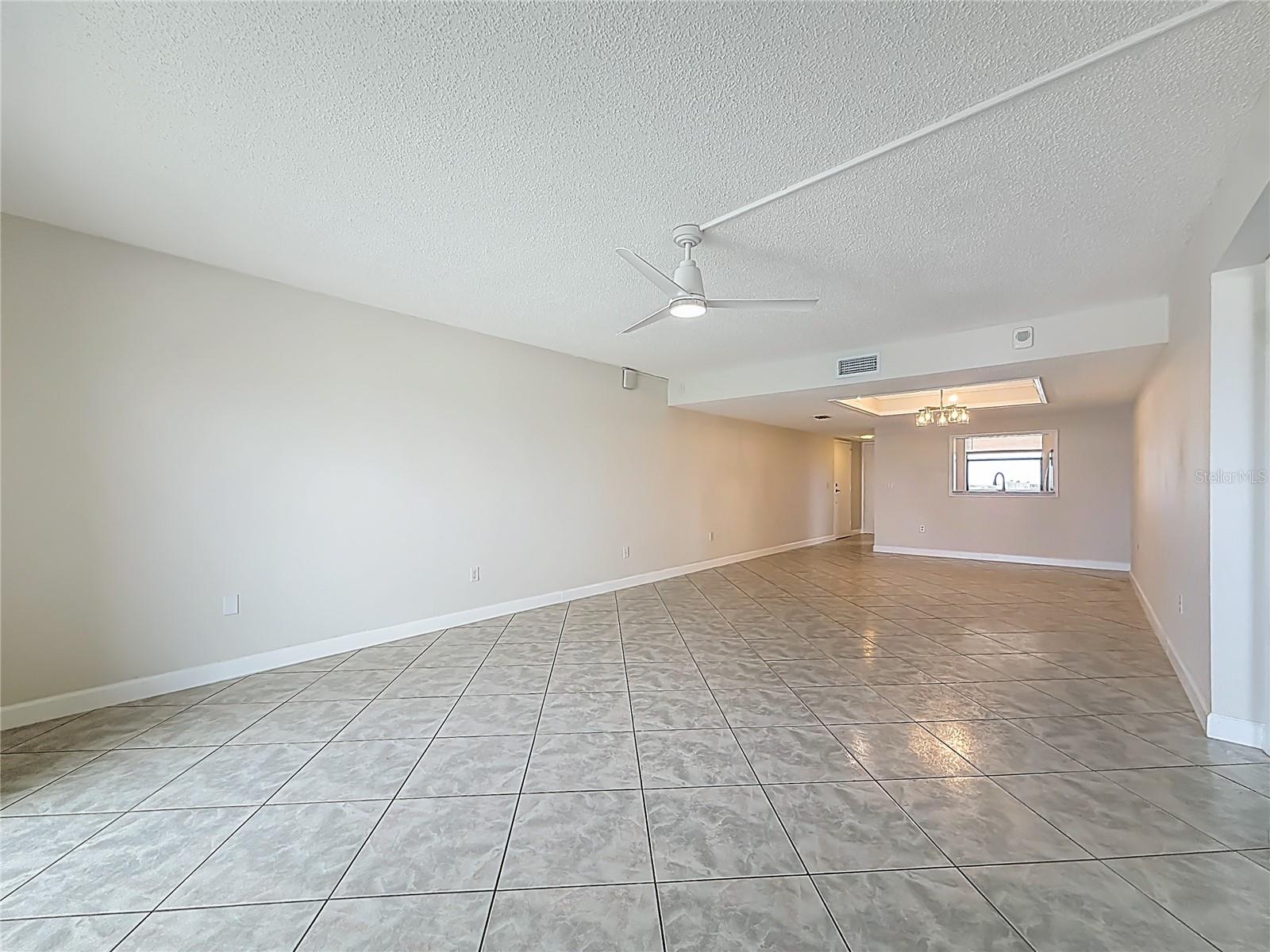 This is the living and dining area looking back from the balcony