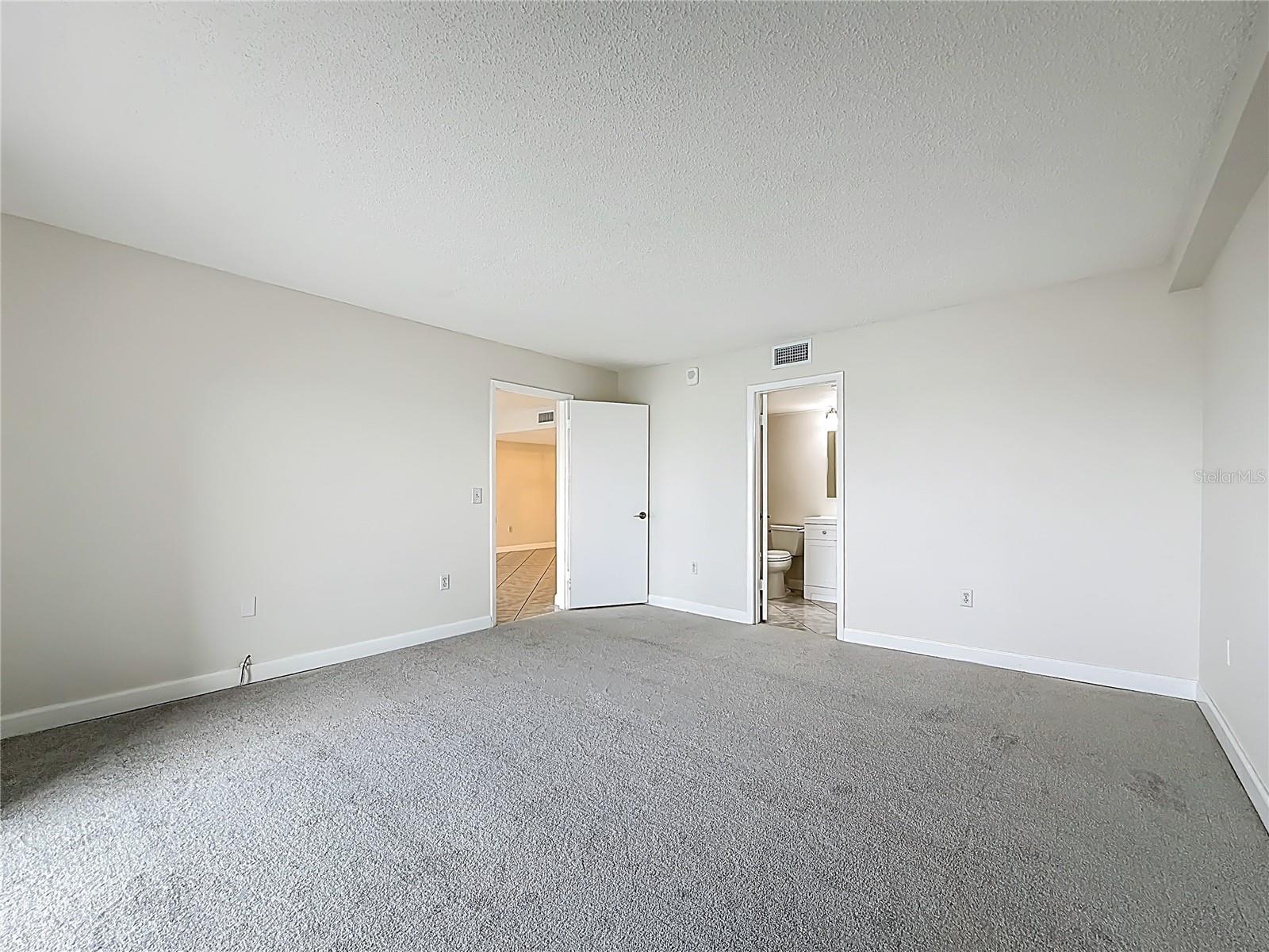 The primary bedroom has an ensuite bathroom
