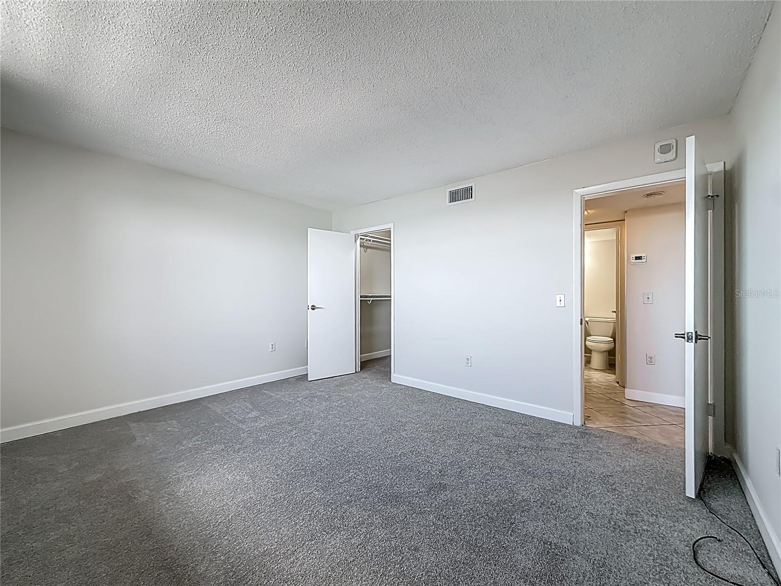 The 2nd bedrrom has a walk-in closet and the guest bathroom is right across the hall from this bedroom