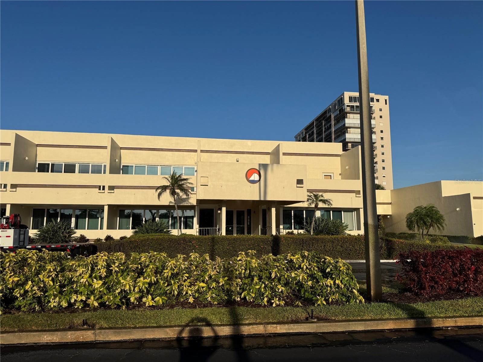 Clubhouse at Bay Island with billiards, meeting, entertainment and card rooms plus a gym and office for management