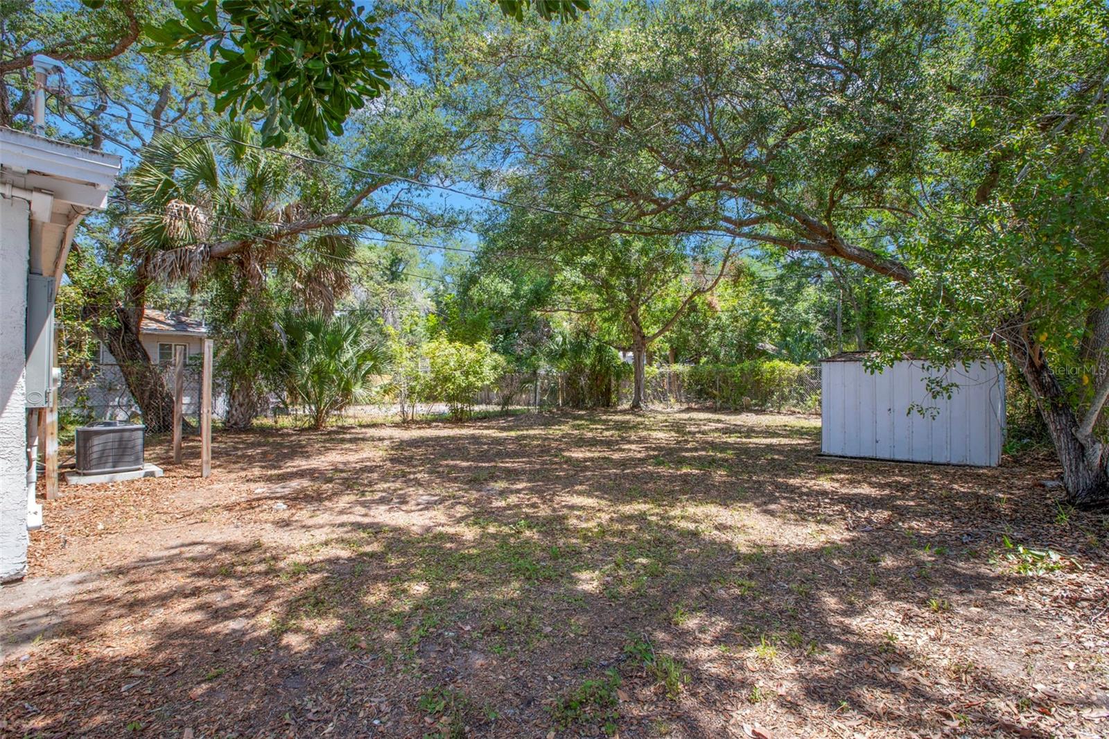 Generously sized backyard offers ample space for pets, play, or future outdoor living additions.