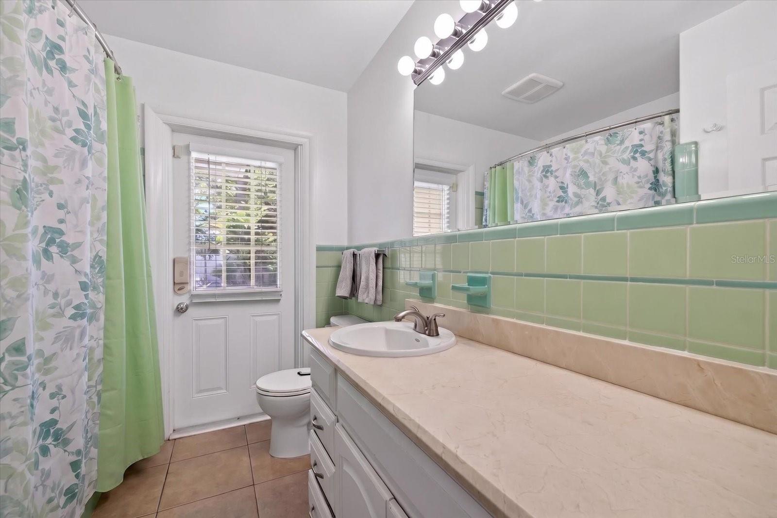 Guest Bathroom wit Pool Access