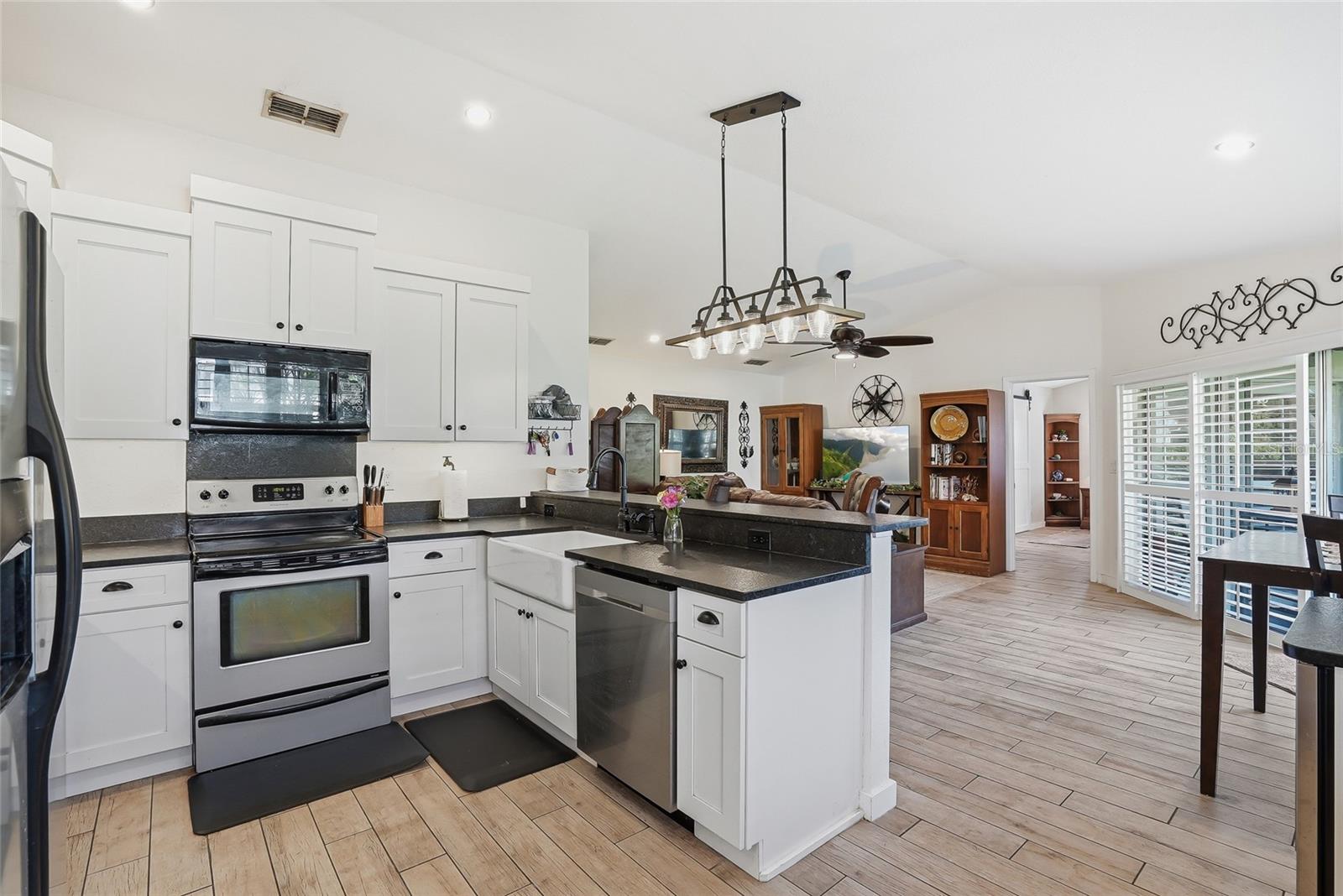 Light and bright with beautiful plantation shutters on all windows.