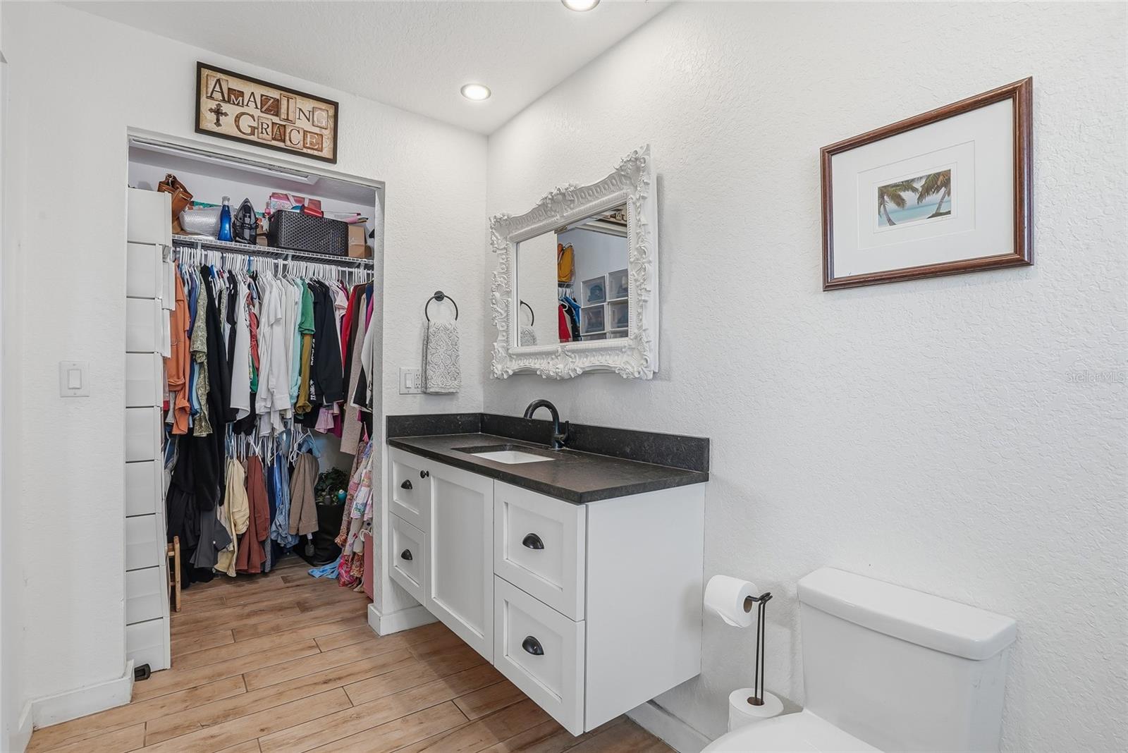 Primary walk in closet.