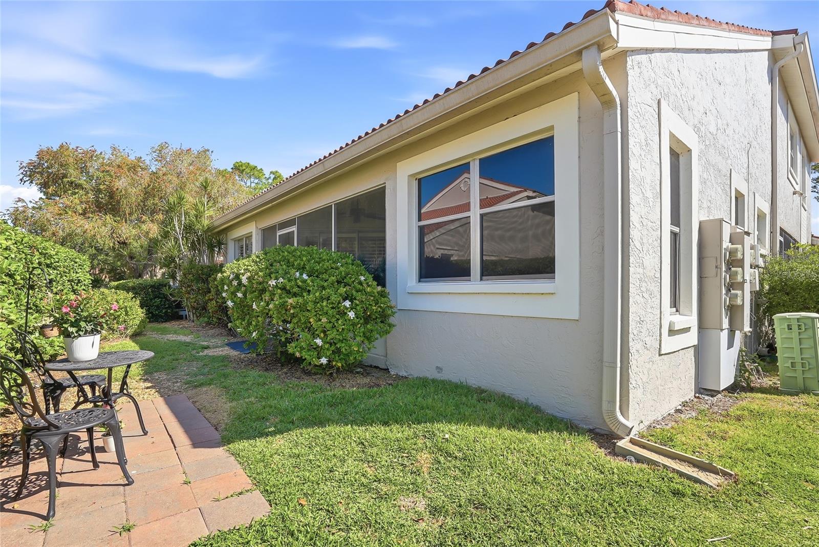 Rear view of the unit with no neighbors next to the primary suite.