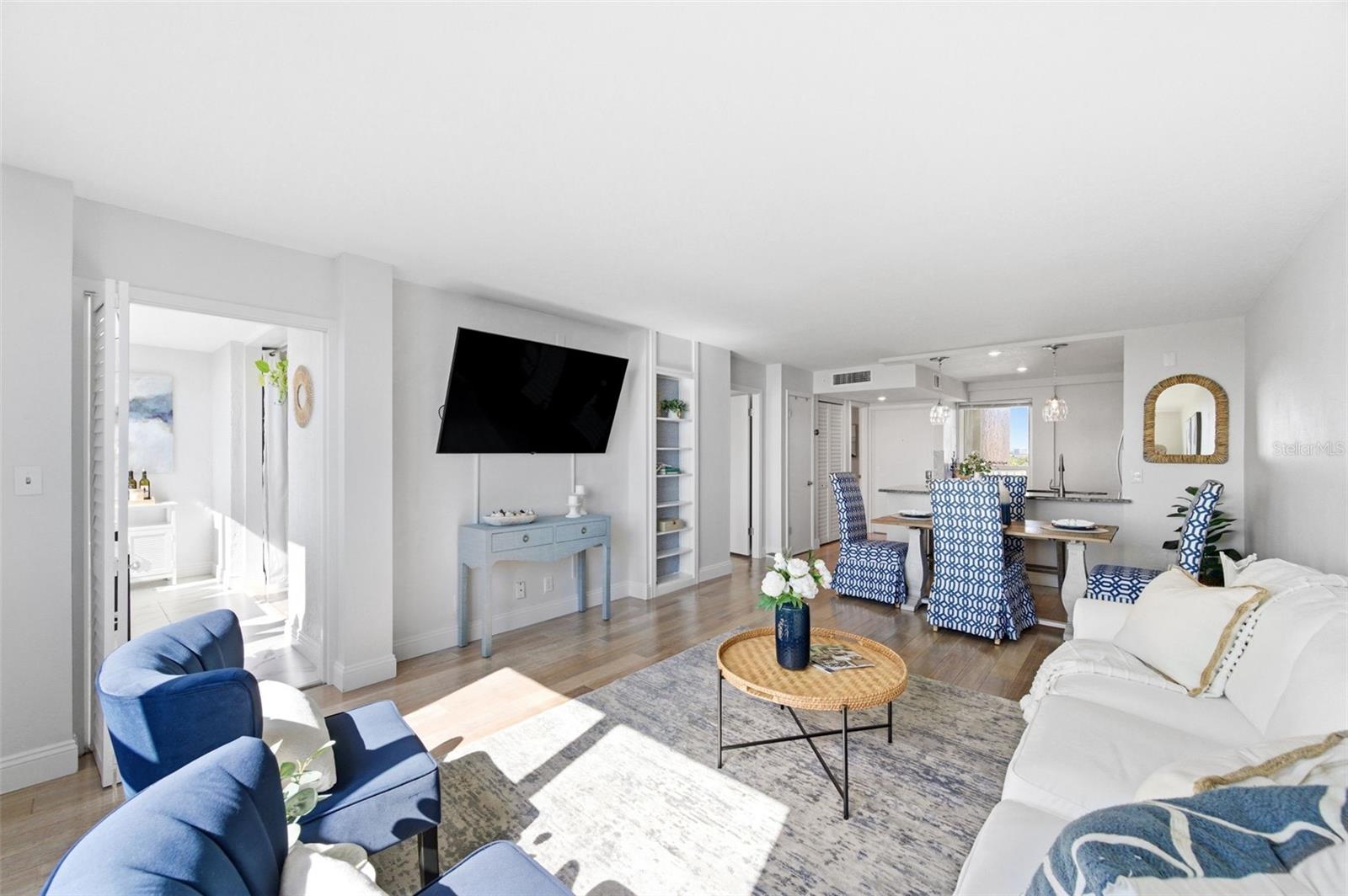 Living room with Sunroom door on the left.