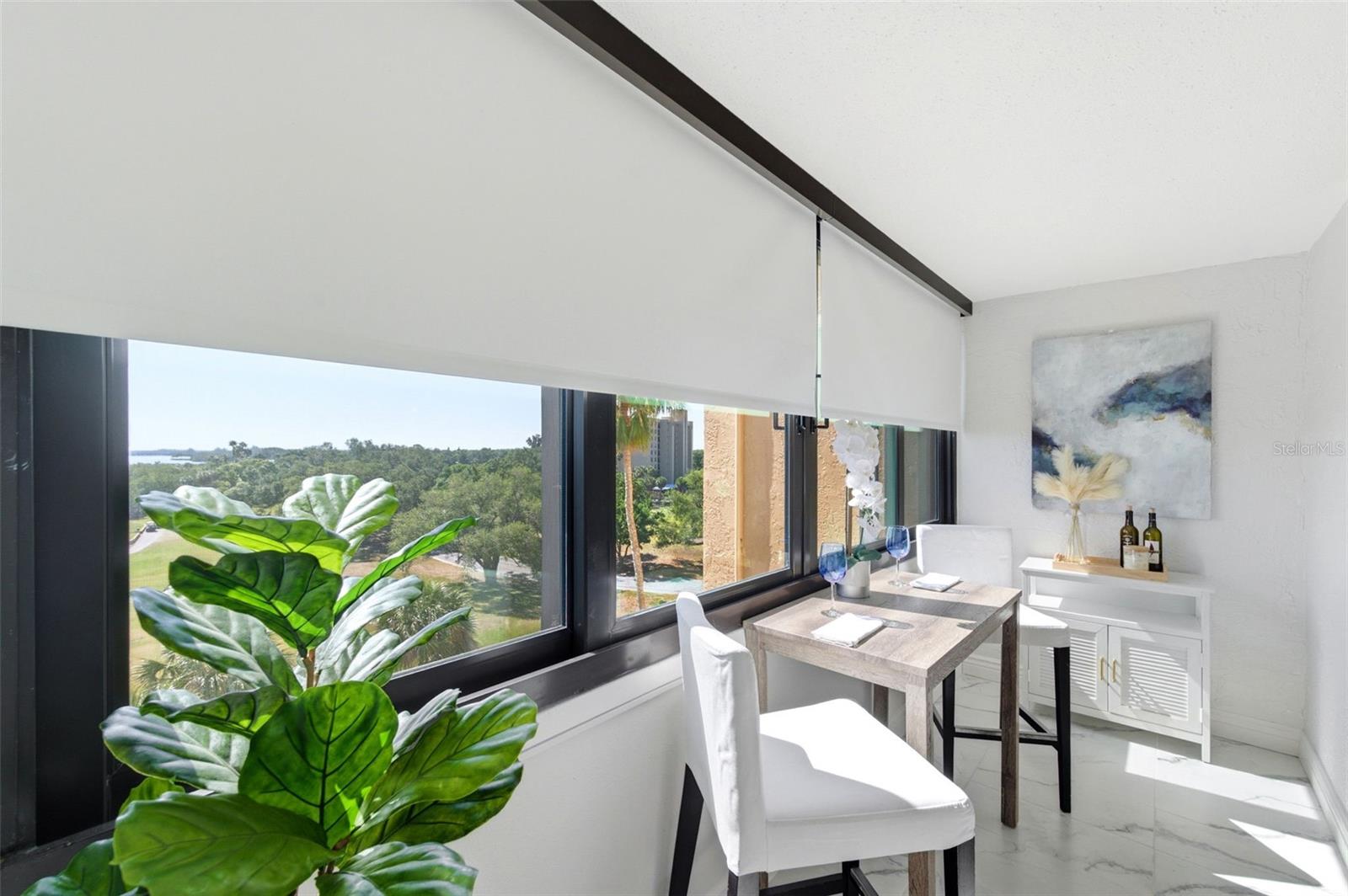 Sunroom has automatic blinds as well.