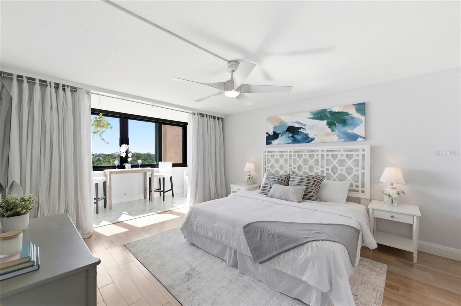 Spacious bedroom opens to the Sunroom.