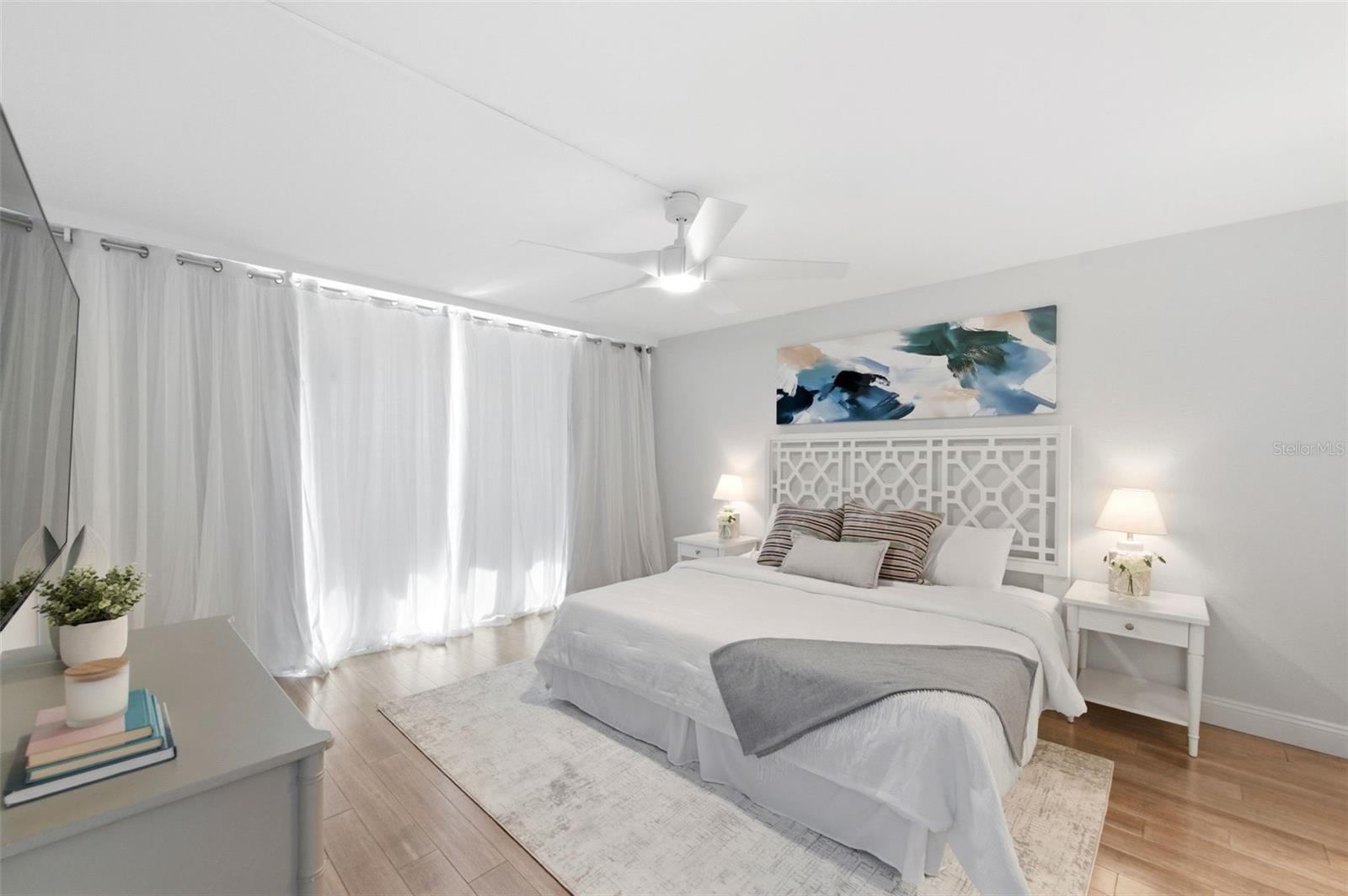 Bedrooms with curtains drawn closed.