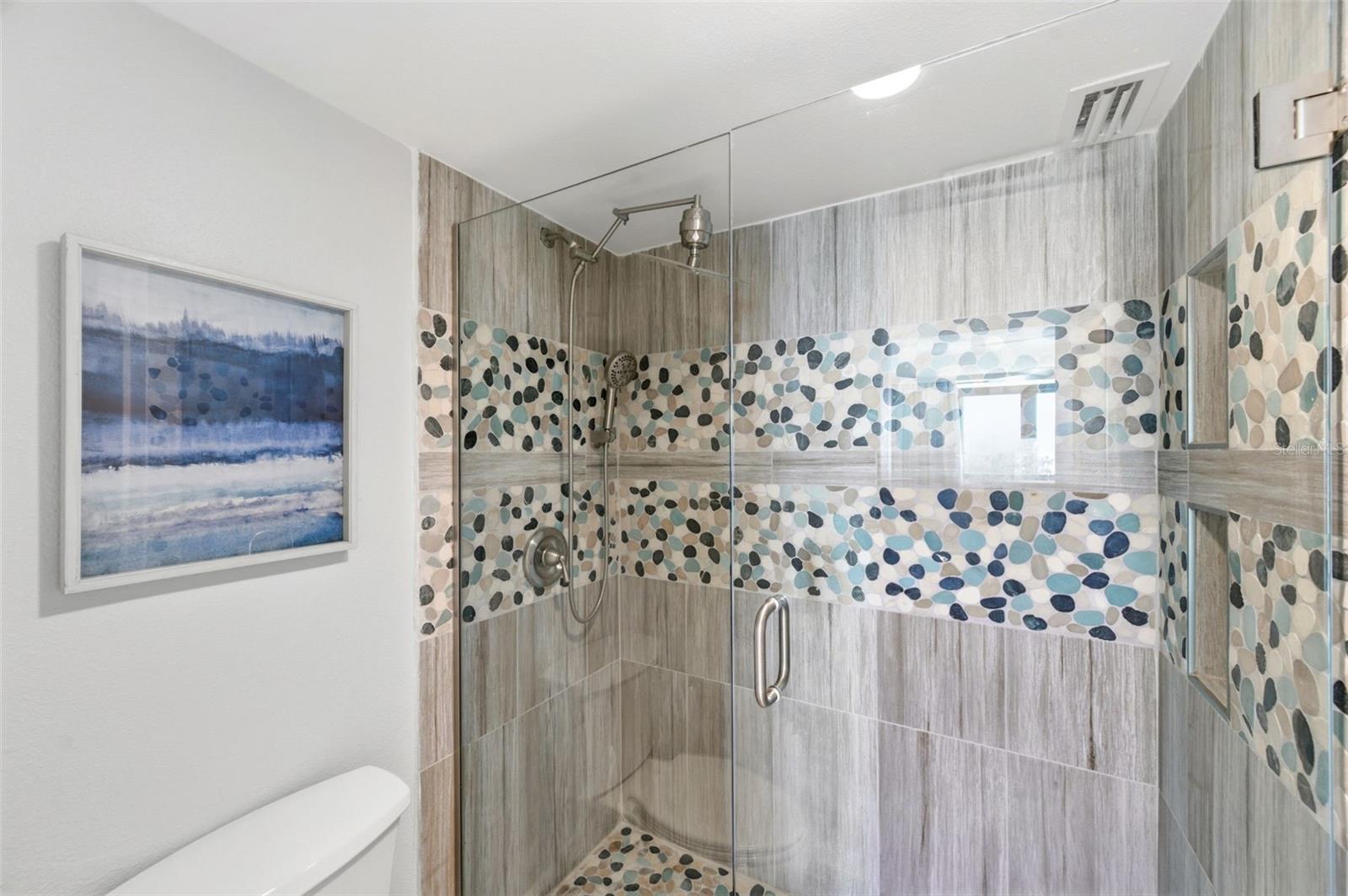 Primary bathroom with rain shower head.