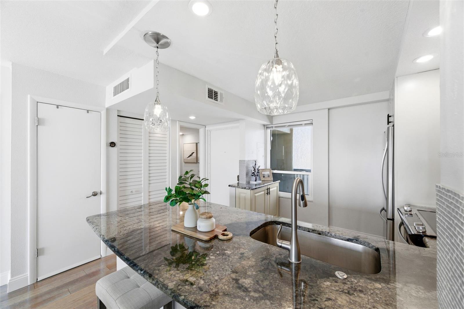 Large kitchen counter with space to eat.