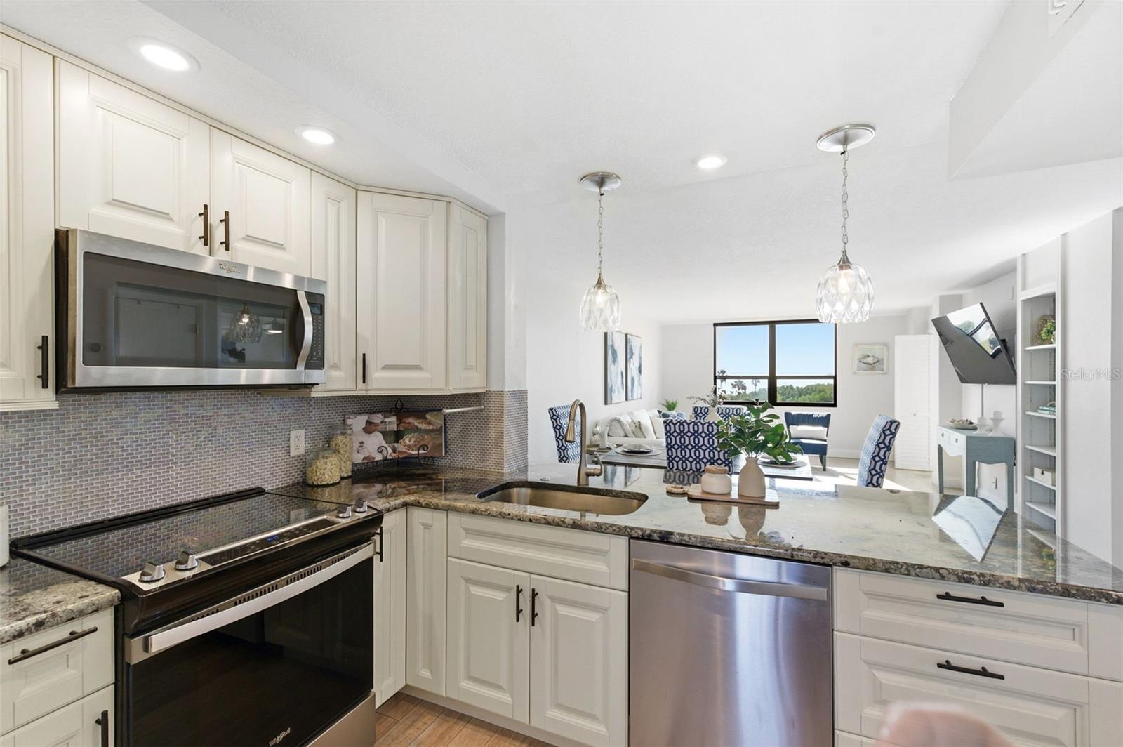 Views of the golf course with the bay in the background can be seen from your kitchen sink!
