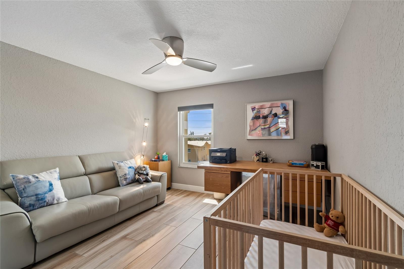 Gorgeous, driftwood style porcelain tile flooring throughout