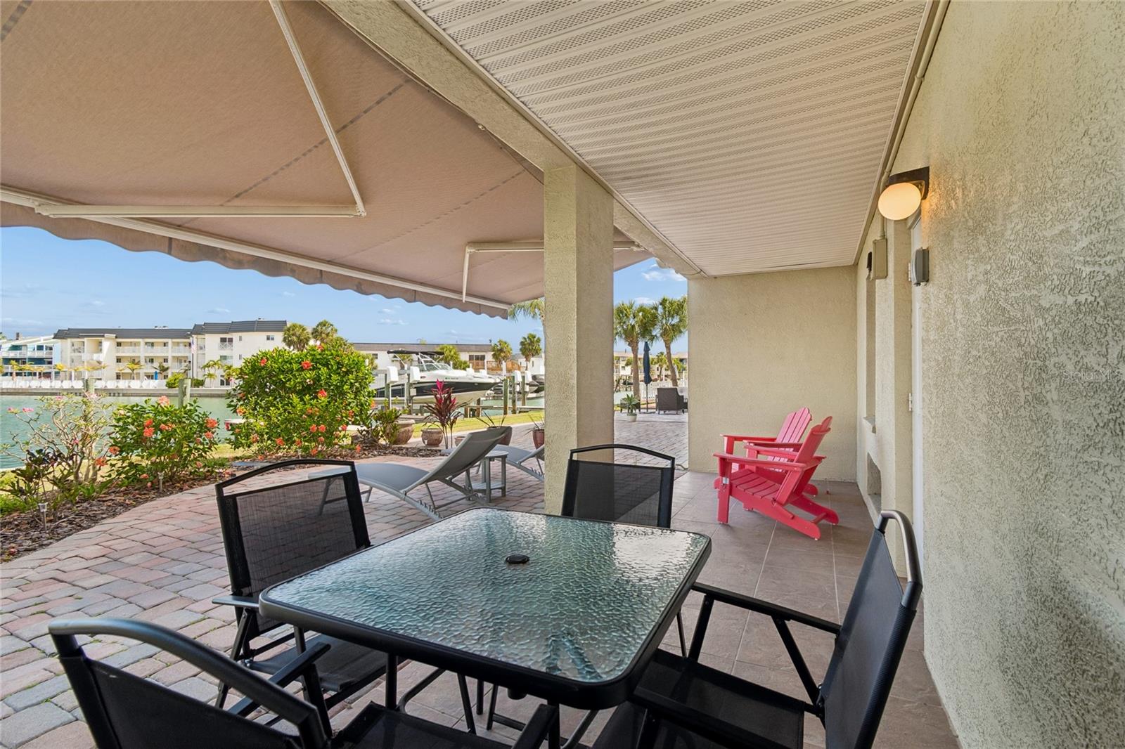 Ground level waterfront patio, perfect for grilling and relaxing by the water