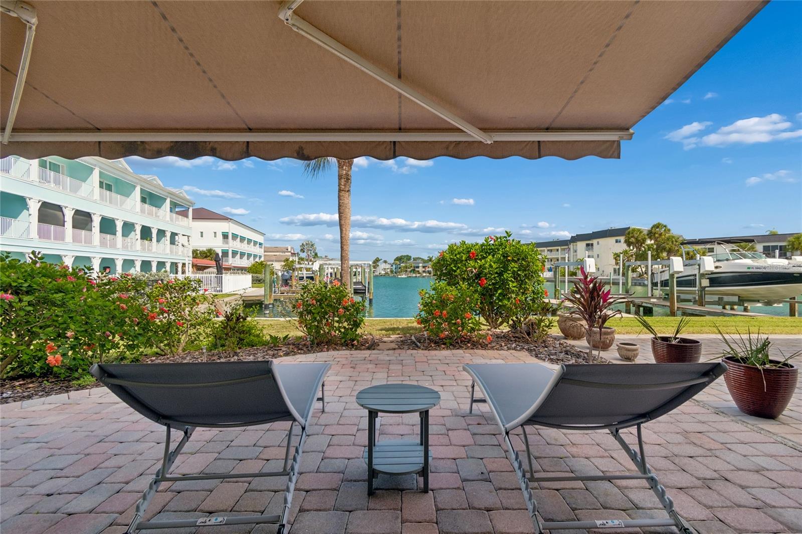 Downstairs you have your own patio right by the water where you can get creative with your plants and grill out