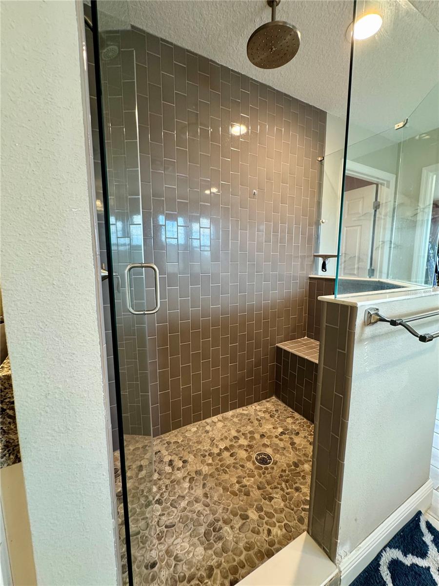 With bench and river rock