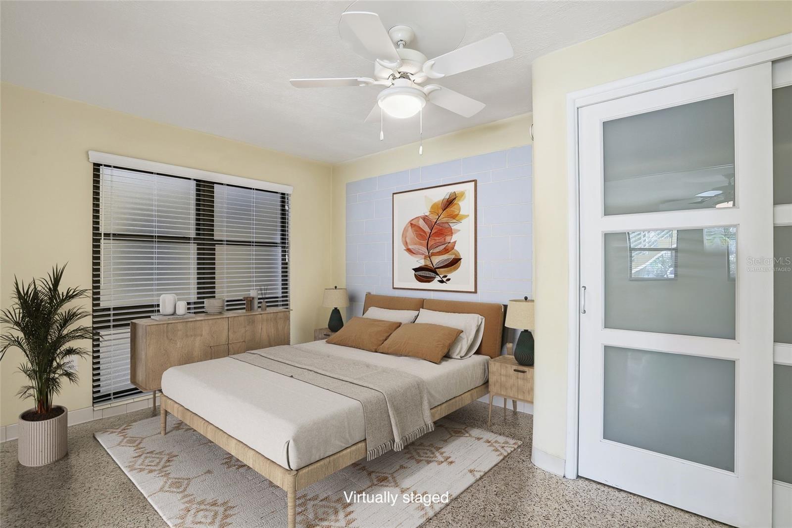 Virtually staged bedroom with closet.