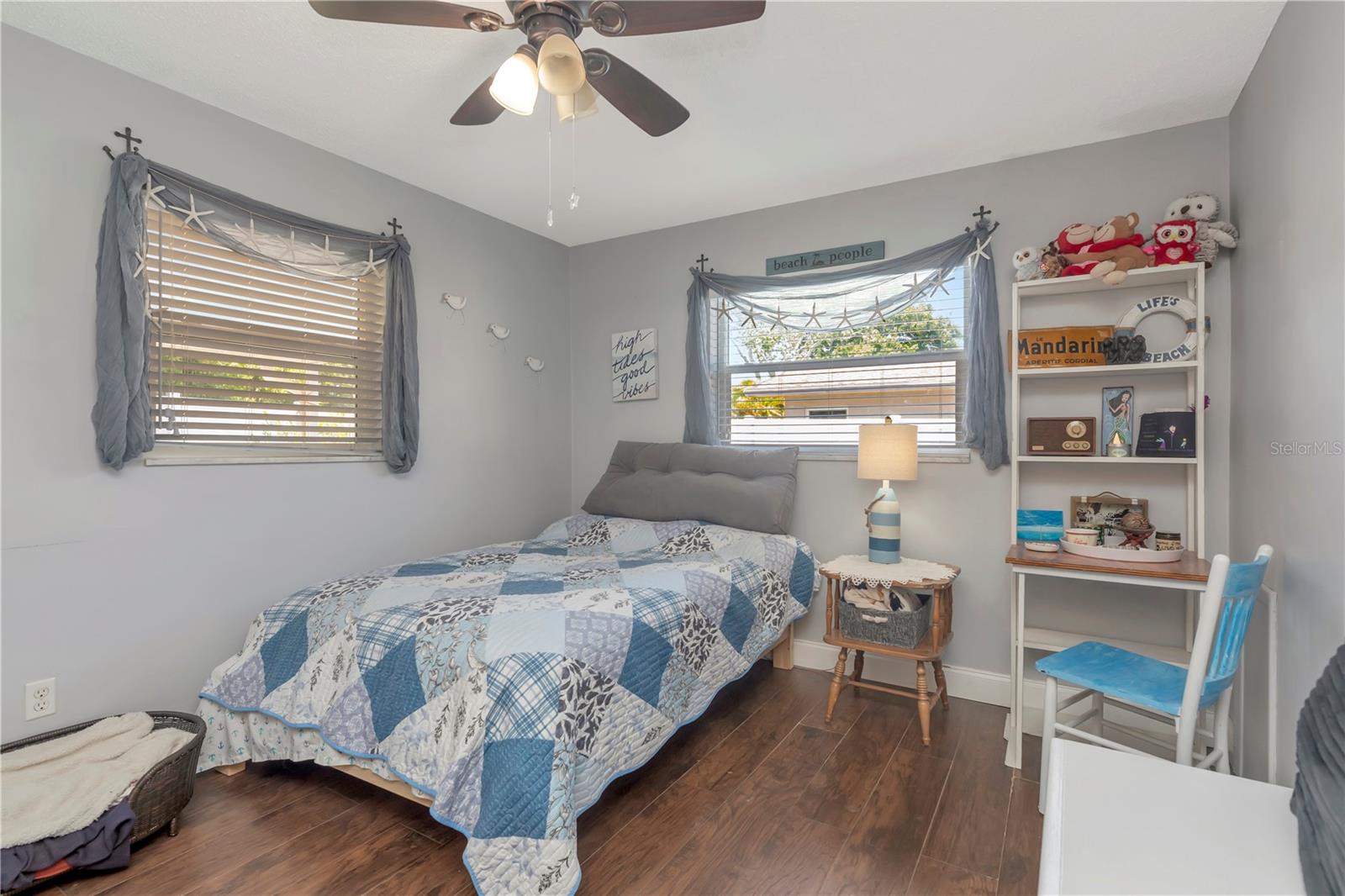 second bedroom, lots of light and deep closet