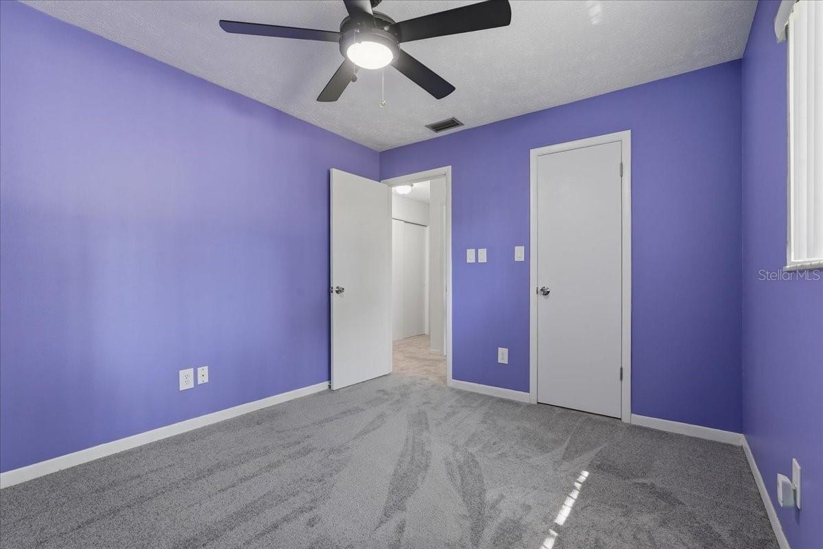 Bedroom 2 includes a walk-in closet