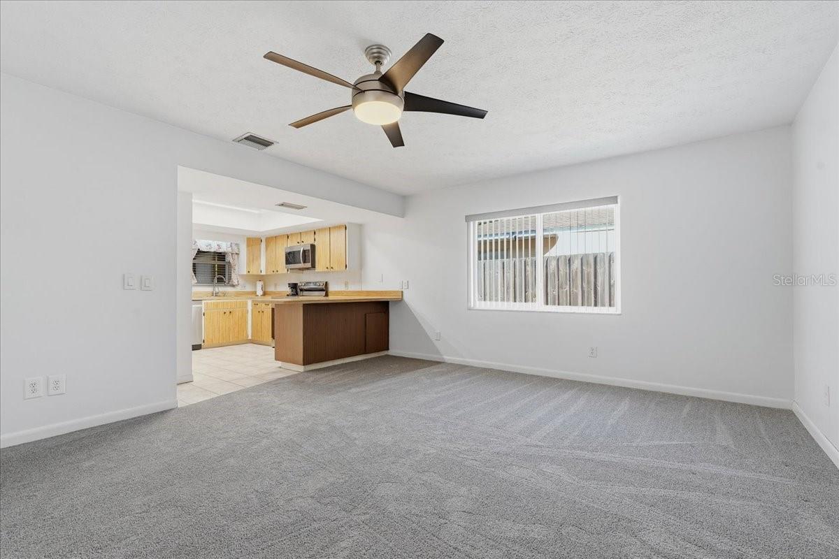 Family Room with Lighted Ceiling Fan