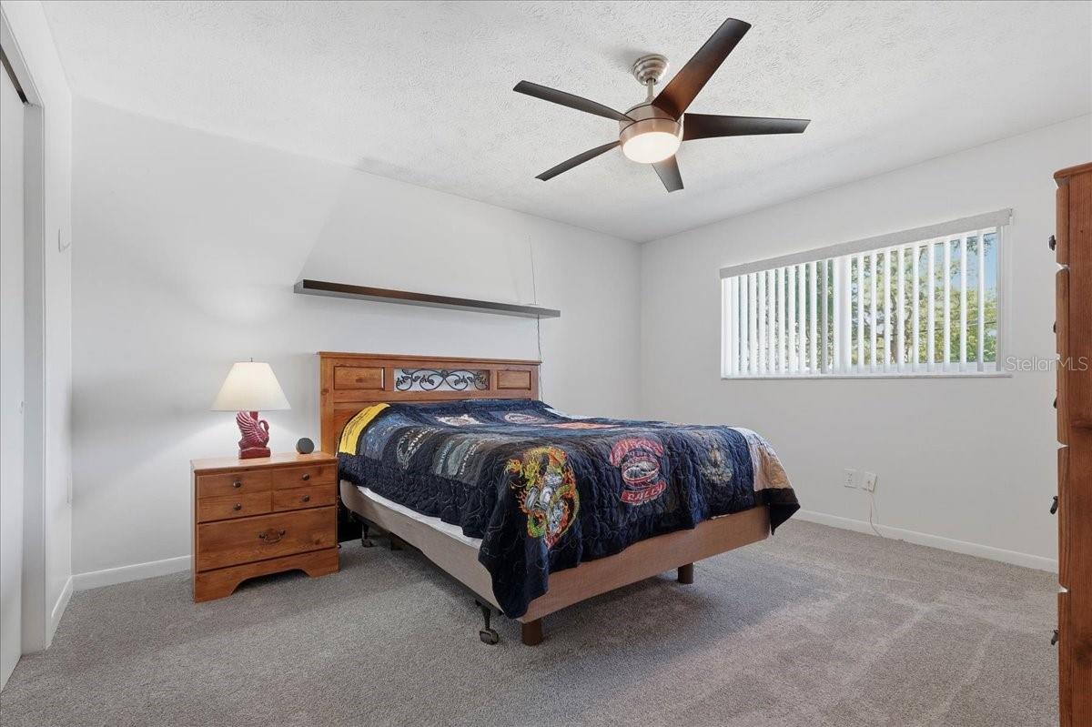 Primary Bedroom with Lighted Ceiling Fan