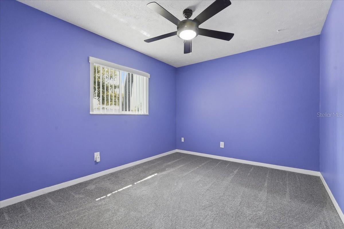 Bedroom 2 with Lighted Ceiling Fan