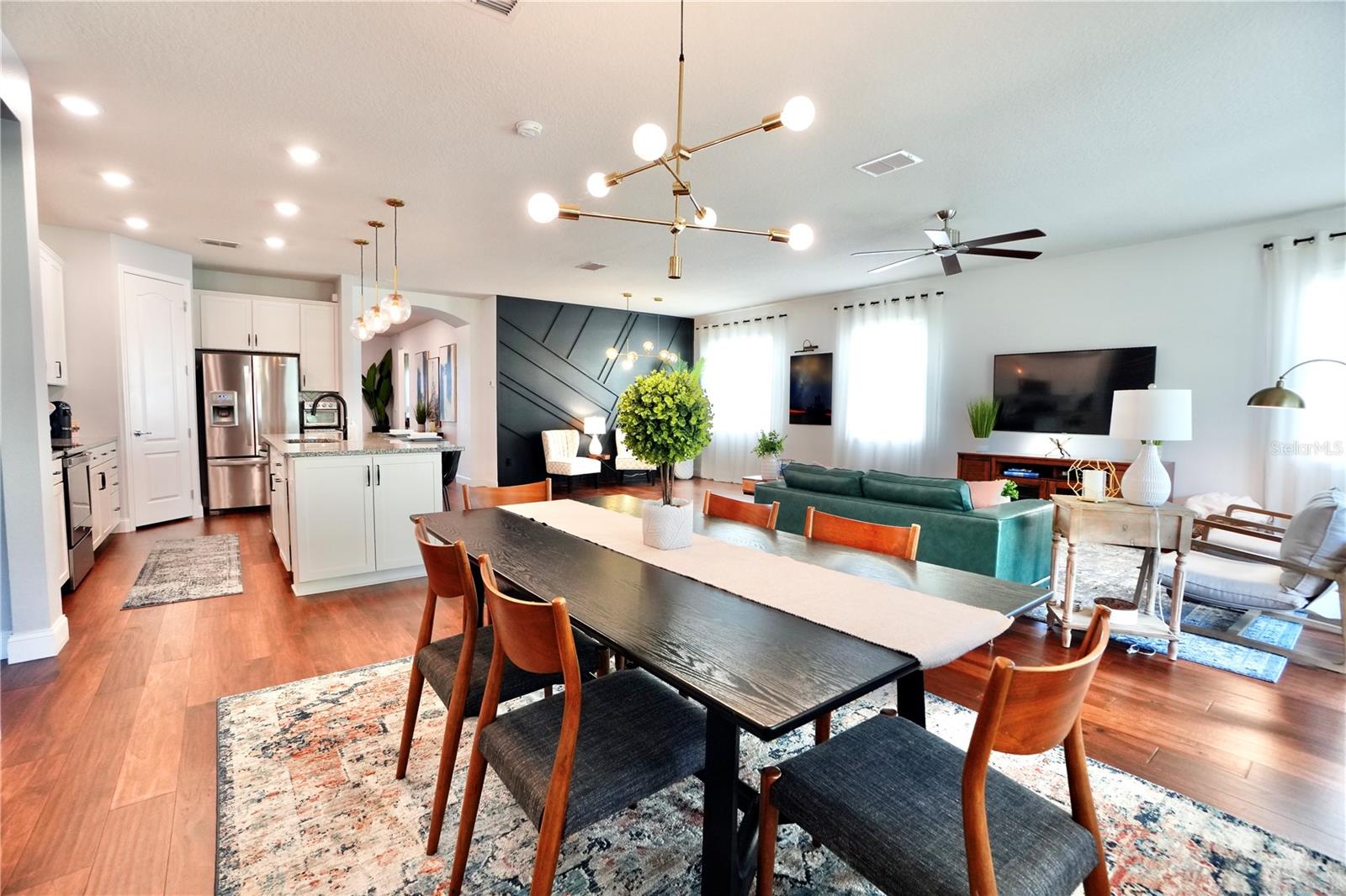 Upgraded lighting fixtures in the open concept living areas.