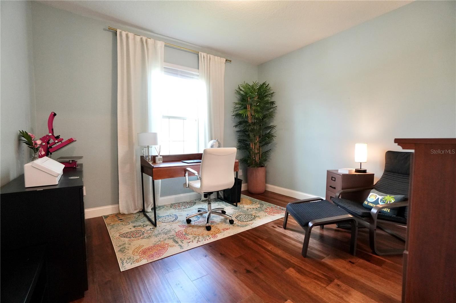 Bedroom 2, currently utilized as a home office.