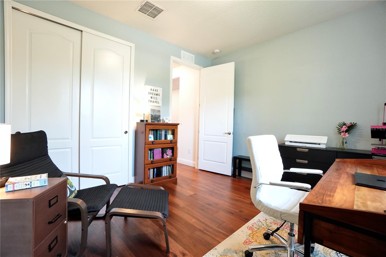 Wood floors in bedroom 2.